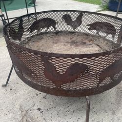 Very heavy open fire pit needs a paint job please see pictures  32 x 32 and 21 inches high 