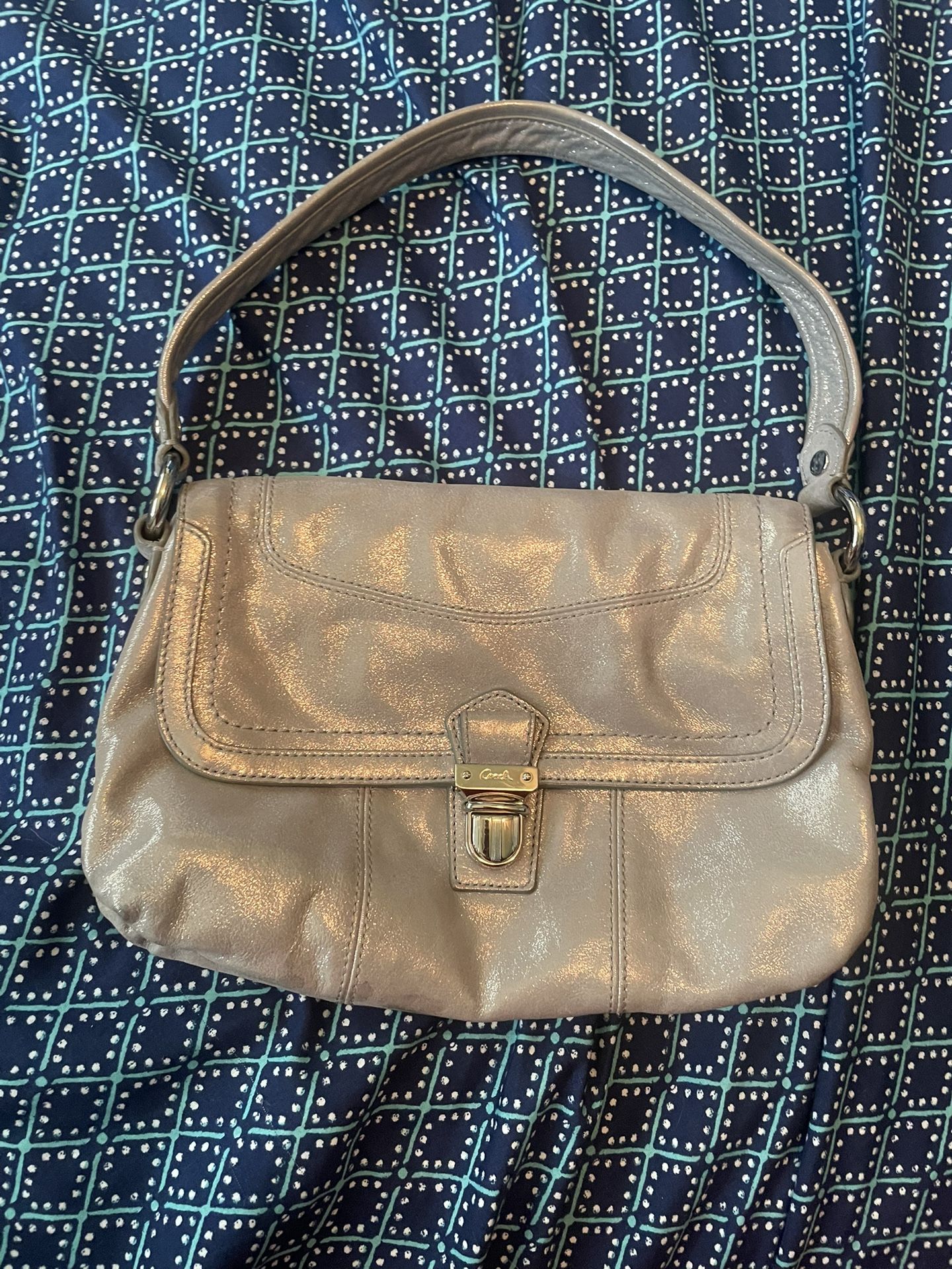 Perfect, small silver coach purse no wearing or damage