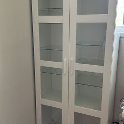 Beautiful White brimnes cabinet With Glass Shelves And Doors!