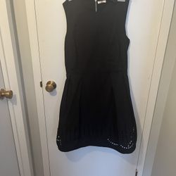 Gap Woman’s sleeveless black summer dress. Zipper back.detailed bottom. Large