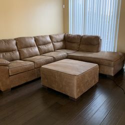 Sectional with queen size mattress sleeper and ottoman