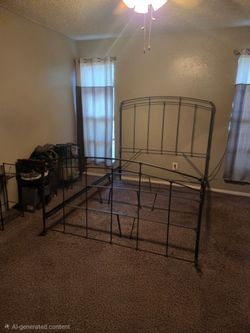 Green/Black Metal Bed Frame with Headboard and Footboard with a Box spring