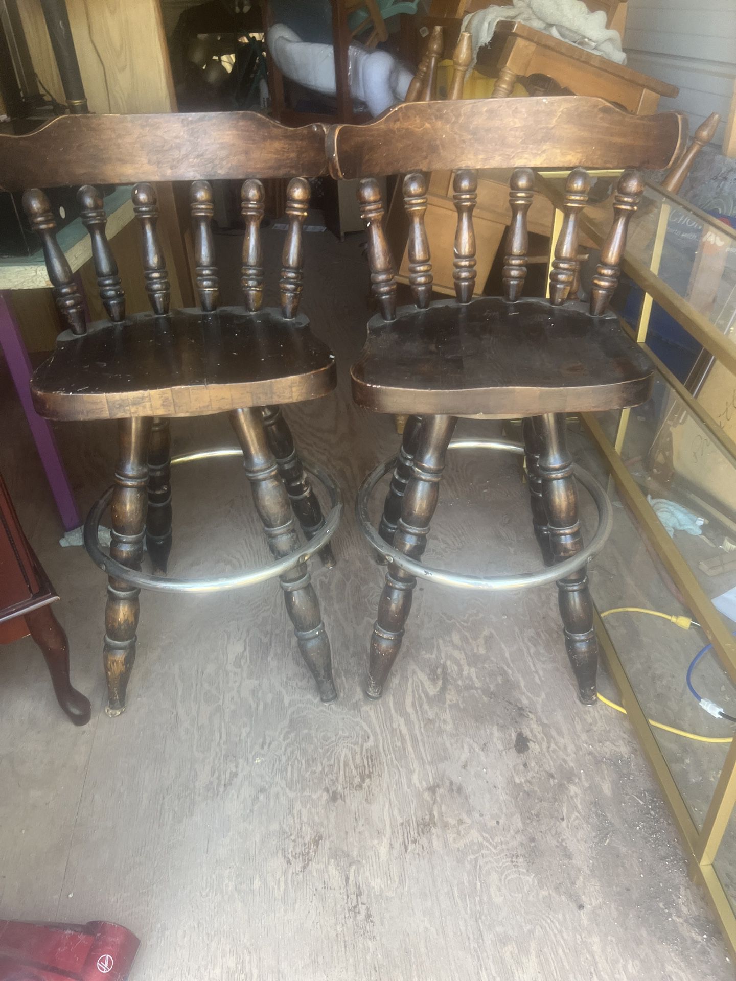 A Pair Of Wood Bar Stools  The Seats Are 27 Inches Tall