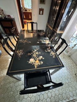Vintage Chinese-Style Black Lacquered Dining Table with Polychrome Floral and Bird Decoration, Extension Leaf, and Six Matching Chairs