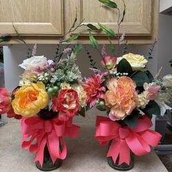 Two Beautiful Artificial Flower Arrangements with Handmade Bows. Please check out my other items for sale.    