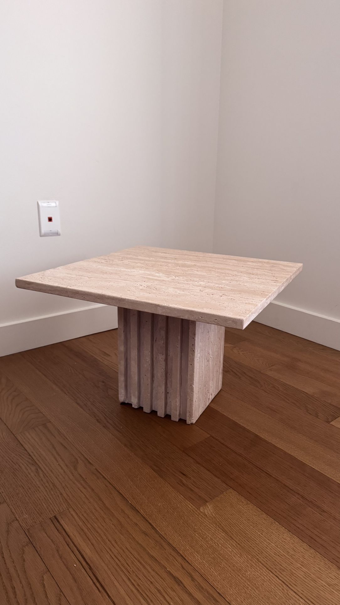 CB2 Carve Travertine cocktail Table