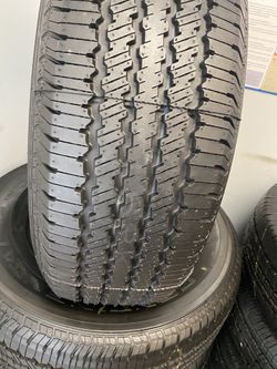 SET 265/70/17 CONTINENTAL SEMI NEW 95%TREAD LIFE $300 PRICE INCLUDE PROFESSIONAL INSTALLATION AND TAX