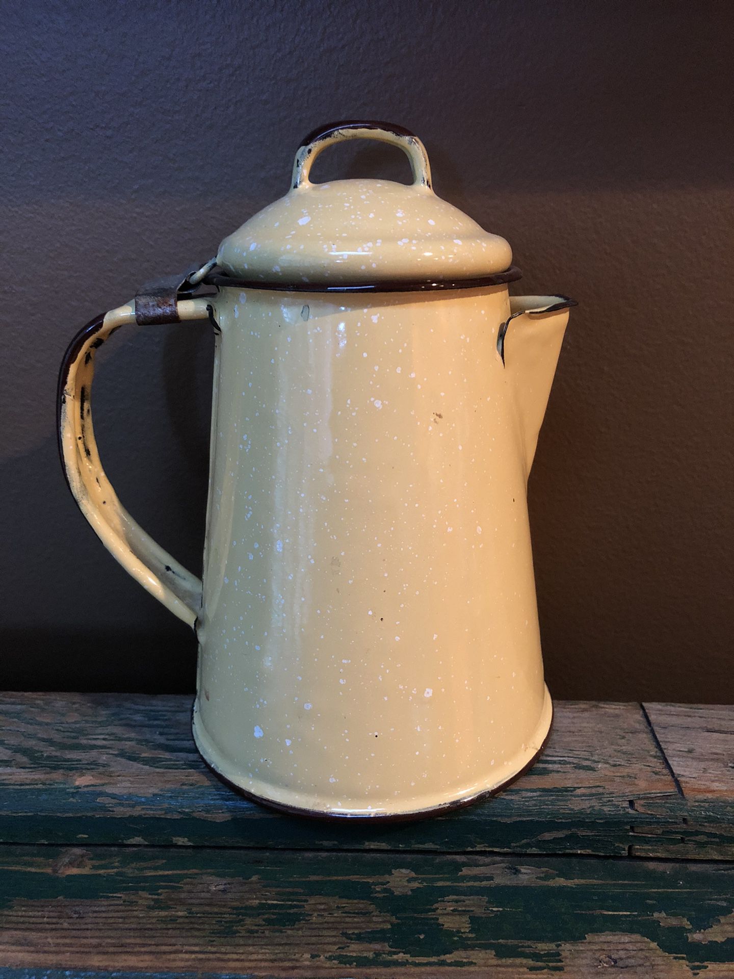 Vintage Small Yellow Enamel Covered Metal Camping Coffee Pot with Attached Lid. Holds about 20 ounces.