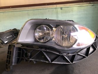2011 bmw 128i driver side headlight