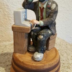 Vintage Emmett Kelly Jr Figurine "Computer Whiz" with stand. This vintage collectible is from flambr