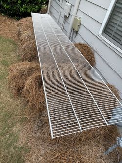Long wire shelving segment with rods and hardware