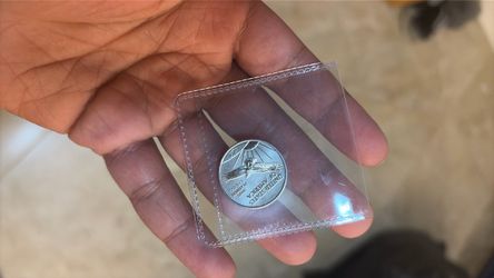 25$ platinum coin