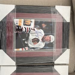 Blackhawks autographed pictures in frame