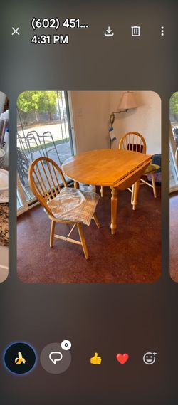 Maple dinette set with two chairs.