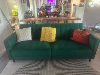 Green velvet convertible couch