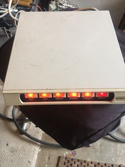 Surge max power center with surge suppressor