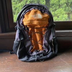 The North Face Orange, Charcoal, and Black Day-Trip Trail Pack or Commuter/School Backpack