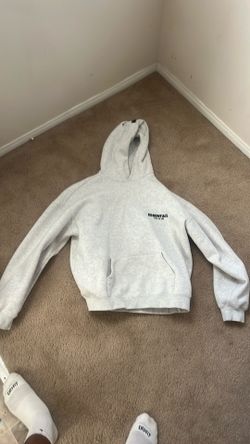 Size large oat kinda of color essentials hoodie with no bag