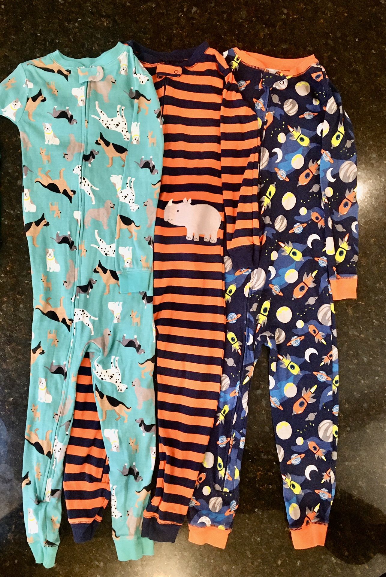 Three Carter’s cotton open-footed onesies, 5T