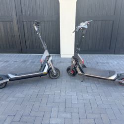 Pair Of Segway GT2P Scooters
