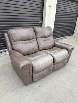 Grey Taupe Power Reclining Leather Loveseat.$175 OBO