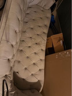 Gray velvety tuffed couch