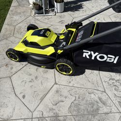 RYOBI Electric 40V brushless 21 inch cordless propelled lawn mower and extra batteries