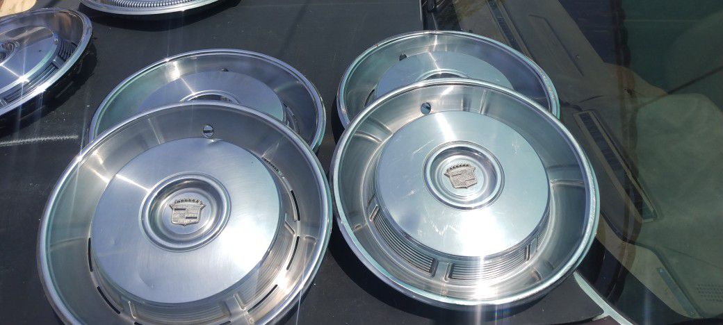 Early '70s Cadillac OEM Hubcaps In Good Condition