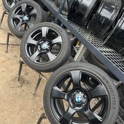 Bmw 17” black wheels and tires $600
