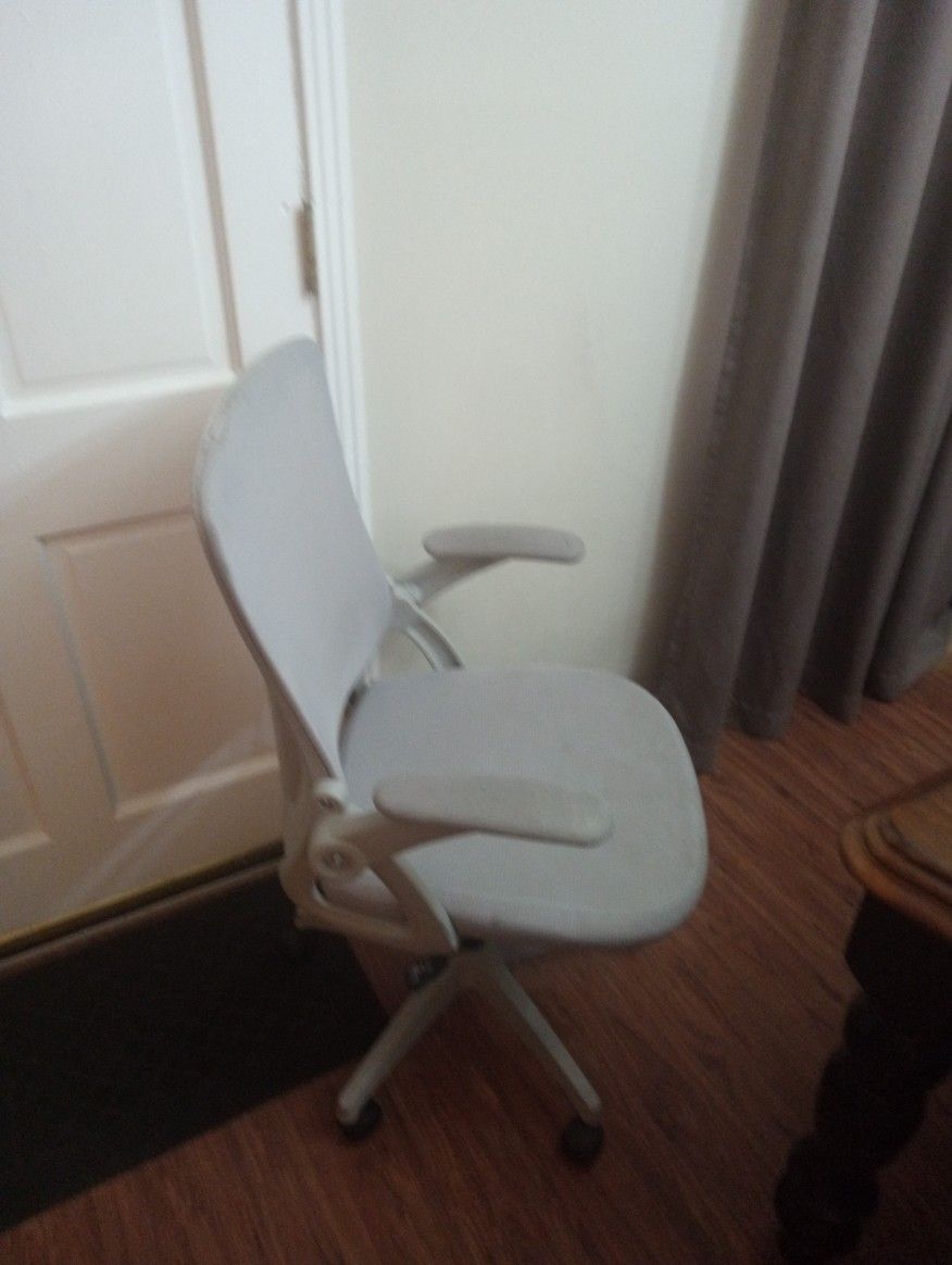 Office Chair Gray Sits Behind A Normal Desk