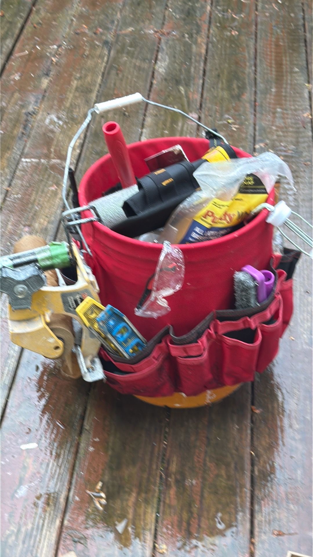 Painting bucket with all the supplies, some new stuff inside bucket