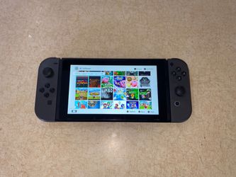 NINTENDO SWITCH V2 with 100 SWITCH GAMES + 7500 Classic Games