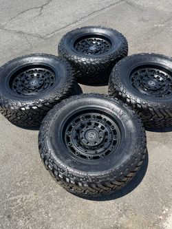 Black Rhino Arsenal 6x5.5 20" Wheels with 37" Fuel Gripper MT Tires