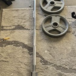 7Ft Olympic Barbell Bar With   Weider Weight Plates 25 Pounds 