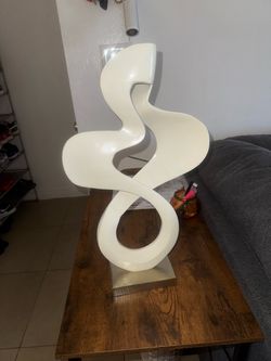 Abstract White Sculpture on Metal Base