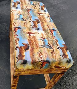 Brand new western style bench with horses