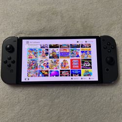 NINTENDO SWITCH OLED with 125 Switch Games + 7500 Classic Retro Games