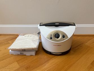 Free with $30 purchase- Rocket grill and parchment bags