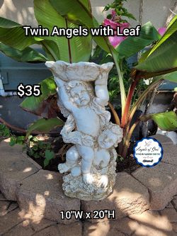 Twin Angels With Leaf