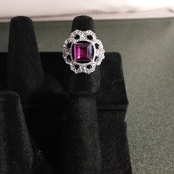Purple Stone Ring With Little Stones Around The Ring