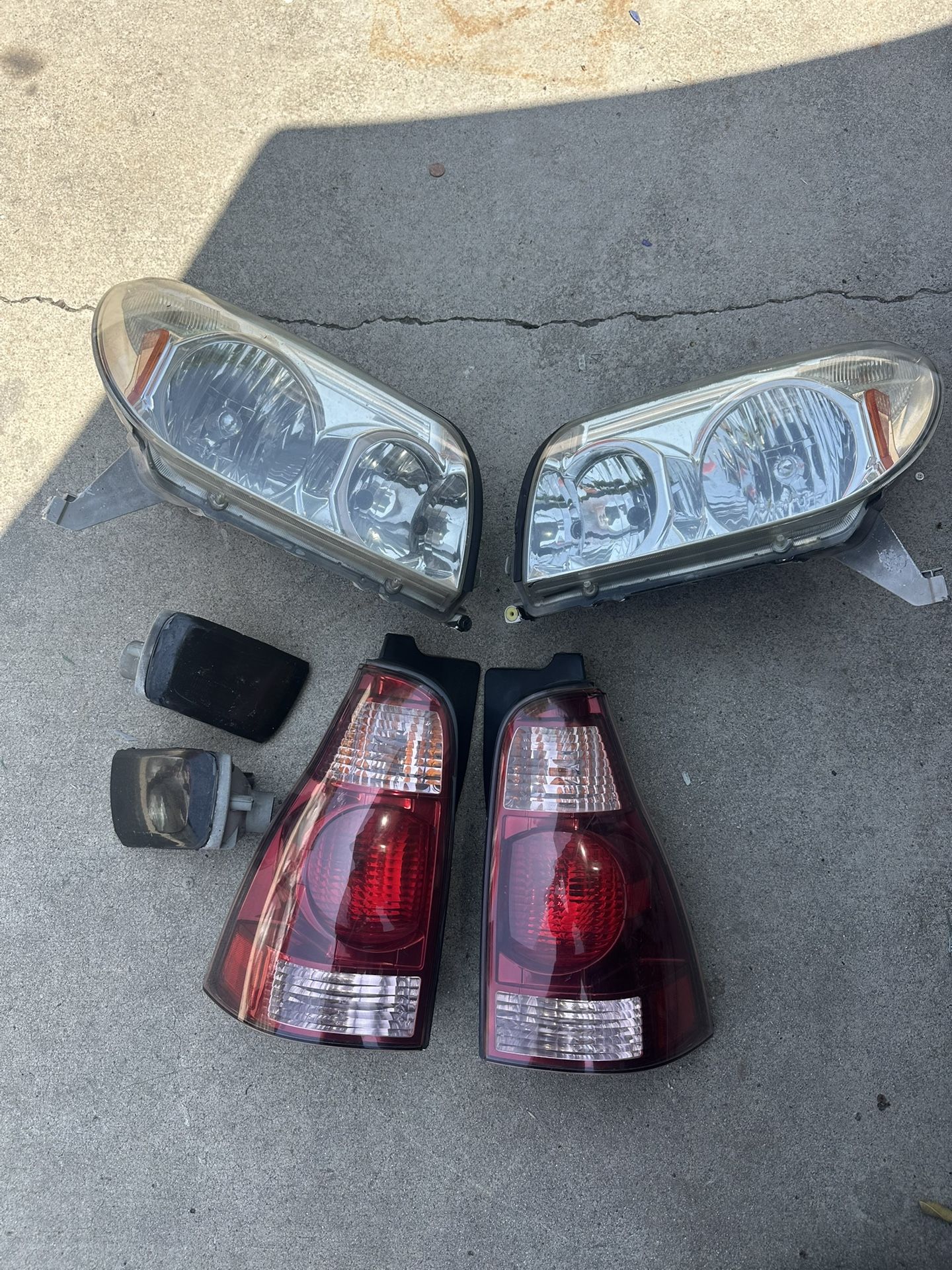 OEM 2003-2005 TOYOTA 4RUNNER HEADLIGHTS AND TAIL LIGHTS HALOGEN CHROME DRIVER 4 Pk