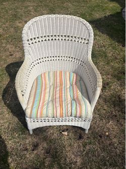 White wicker outdoor chair
