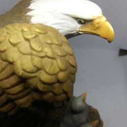 LARGE EAGLE AND BABIES STATUE