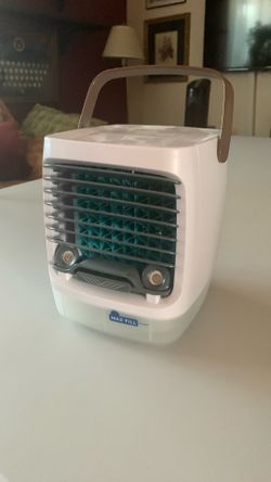 Portable individual evaporative cooler