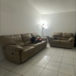 Reclining leather sofa and love seat