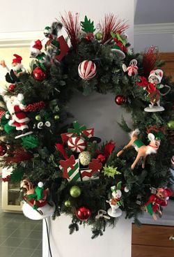 Christmas Wreathe Huge 5 feet . New custom made with collectible Anna lee decorations.