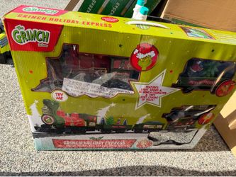 Grinch Holiday Express 36 piece train set collectors edition