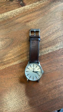Nixon Sentry leather watch face