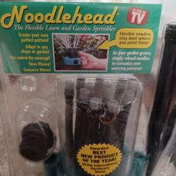 NEW Never Opened: NOODLE HEAD FLEXIBLE  LAWN AND GARDEN SPRINKLER $10. 