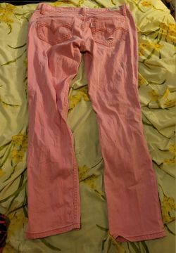 Levi's pink Rise low ripped jeans